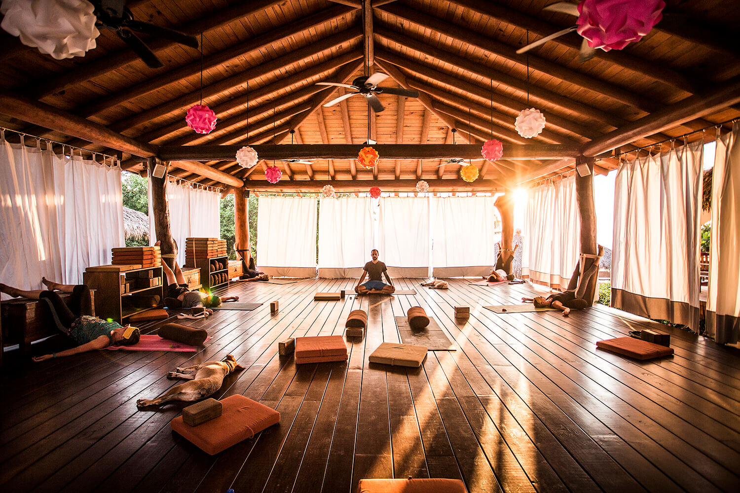 Gentle yoga at sunset in the yoga pavillion